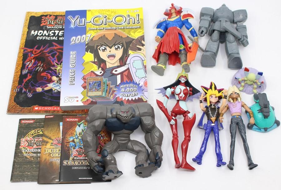 Collectables: A Collection Of Assorted Yu-Gi-Oh Figures Within Carrying ...