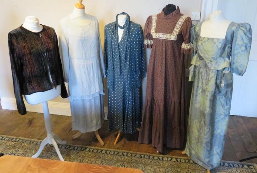 A late 1960s Laura Ashley size 14 in mauve/brown floral pattern with cream  lace detail