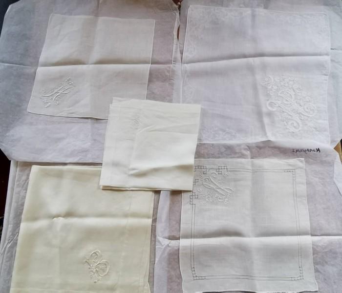 A white cotton lawn handkerchief with the initial H embroidered in the ...