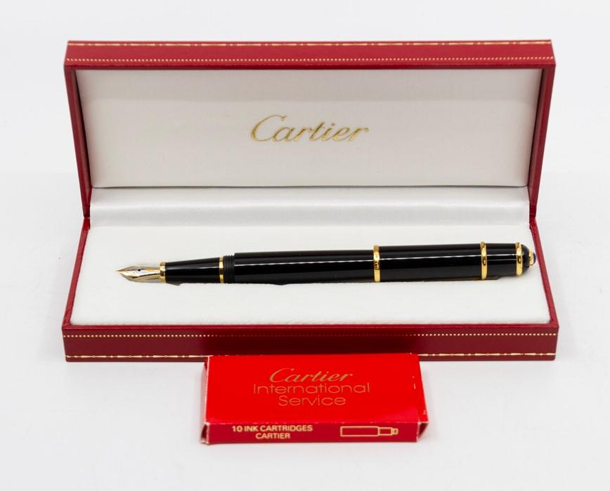 A boxed Cartier Diablo fountain pen, 18kt nib, with spare cartridges ...