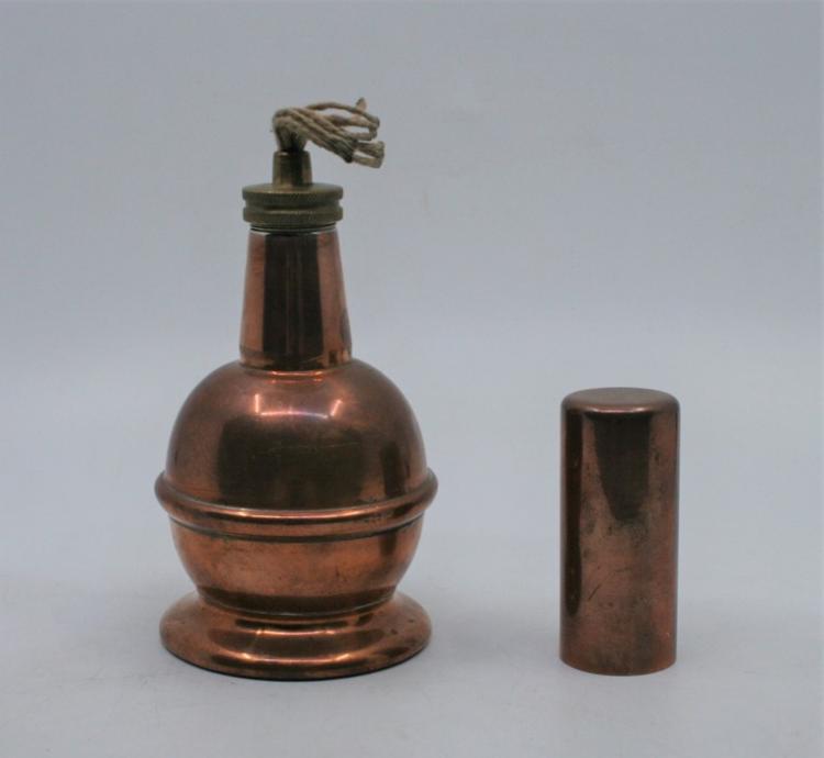 A copper oil lamp in baluster shape made for the GPO by Bladon of ...