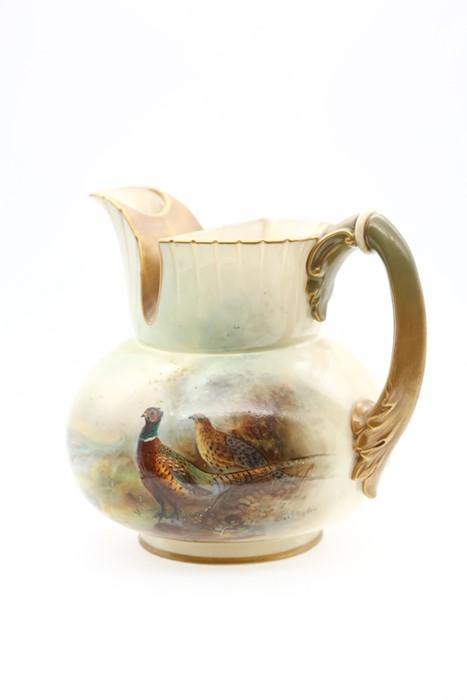 A Royal Worcester shape no: 1438 globular jug, with gilt spout and