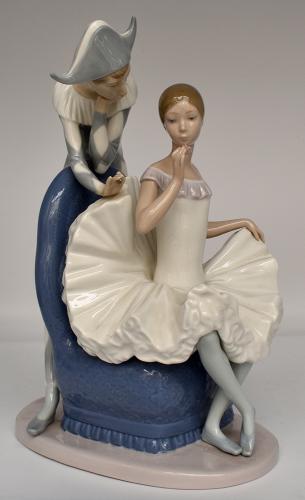 A large Lladro porcelain figural group 'Closing Scene' (ref 4935) of a  ballerina and a pierrot, designed by Salvador Furio, issued 1974-1996.  Height approx 24cm.