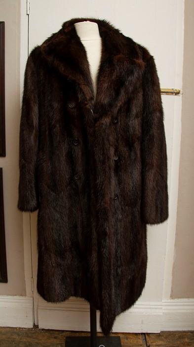 A full length men's double breasted fur coat in shaded musquash