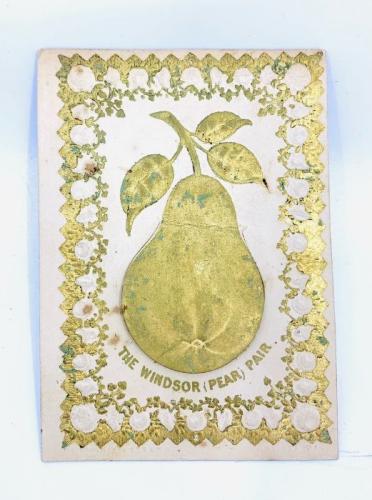 The Windsor (Pear) Pair. Victorian novelty card, c.1863, gilt embossed design by Wood, Strand, the central pear motif lifting to reveal a hand-coloured lithographic portrait of Edward VII and Alexandra (when Prince of Wales & Princess of Denmark). Some toning and pale marks, top corners lightly bumped, two tiny pin-holes. A similar example can be found in the Royal Collection Trust