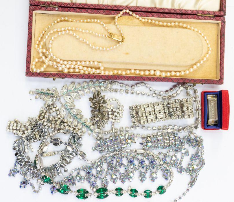 A collection of costume jewellery to include a vintage double strand  graduated cultured pearl necklace on a 9ct gold clasp, in original fitted  case, a silver and marcasite set brooch circa 1950