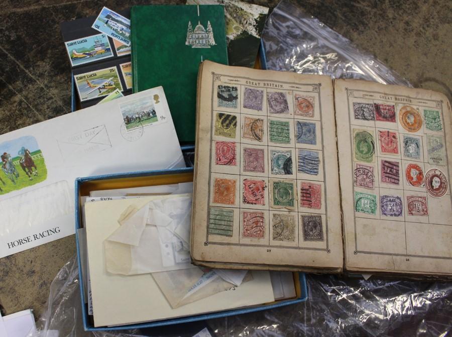 A Lincoln stamp album and box of various stamps first day covers