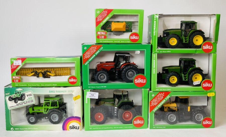 A collection of Siku 1:32 Scale Tractors and implements - to