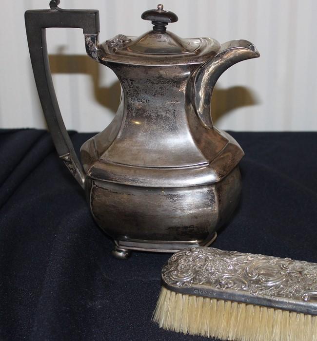 A silver coffee pot, James Deakin & Sons, assayed Sheffield 1928, of