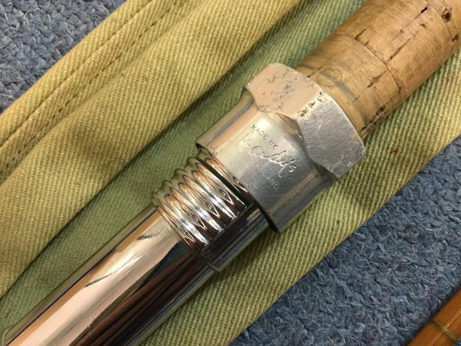 Angling interest: Hardy Palakona No 2 two peice split cane 9 1/2 foot RH  spinning rod. Complete with House of Hardy marked canvas cover.