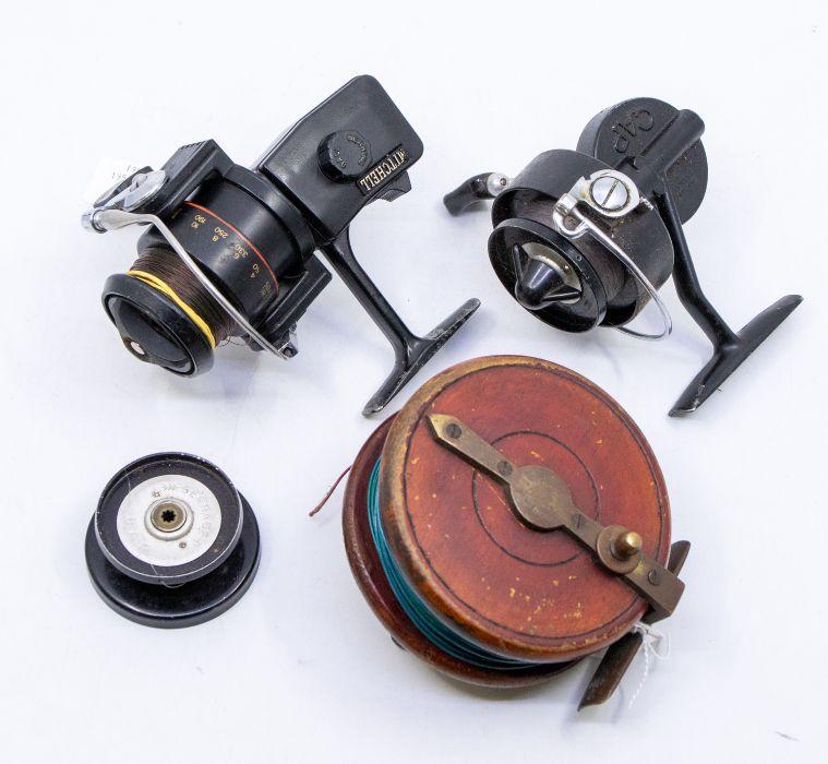 ANGLING INTEREST; A cap fixed spool fishing reel; a Mitchell fixed spool  reel and a wooden reel