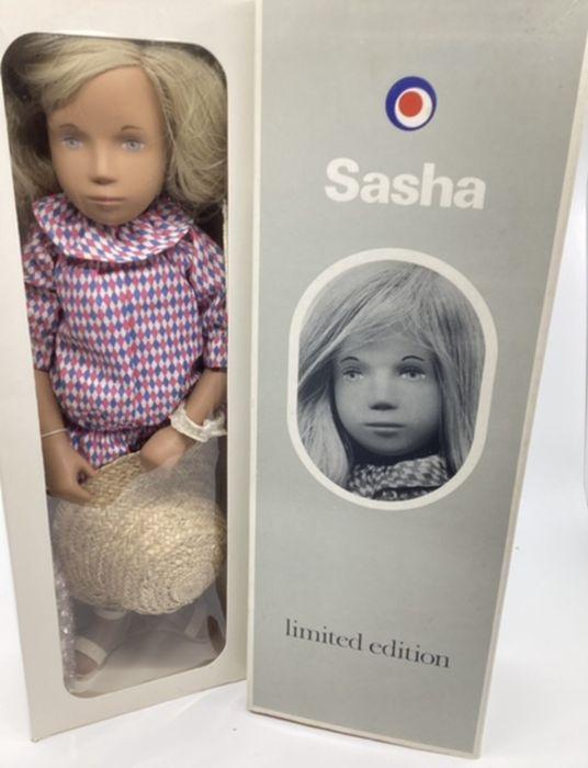 Trendon Sasha doll 184A Harlequin edition doll; 1984 doll with applied fair  wig and all original clothes no wooden guitar and straw summer bonnet ,  together with the Tendon Sara Doggart certificate