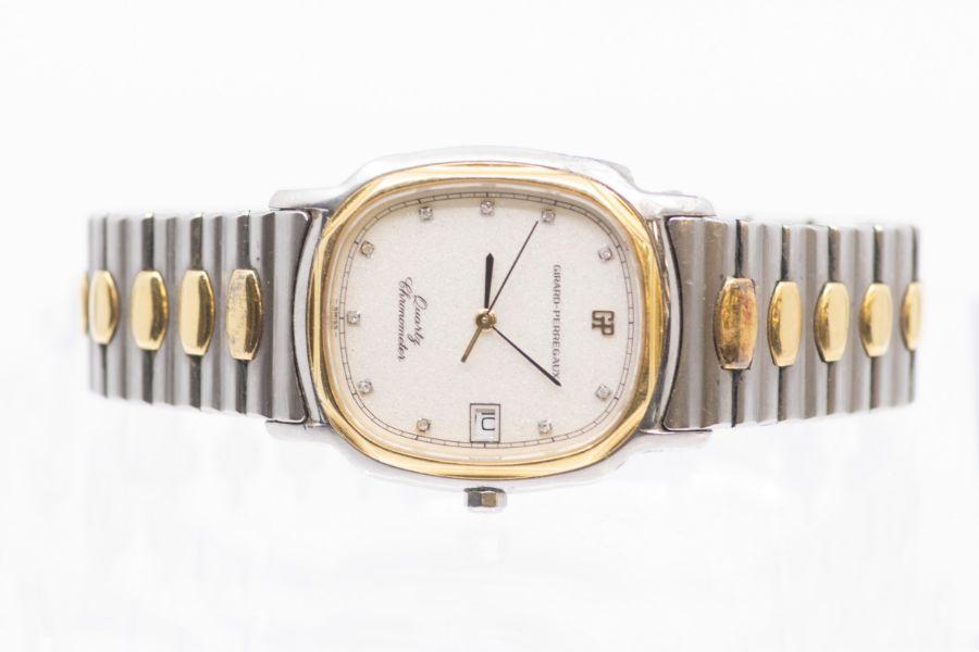 A two tone gents Girard Perregaux quartz chronometer wristwatch