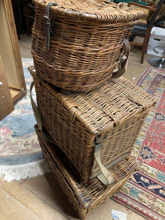 3 vintage wicker fishing baskets two rectangular, one semi circular.