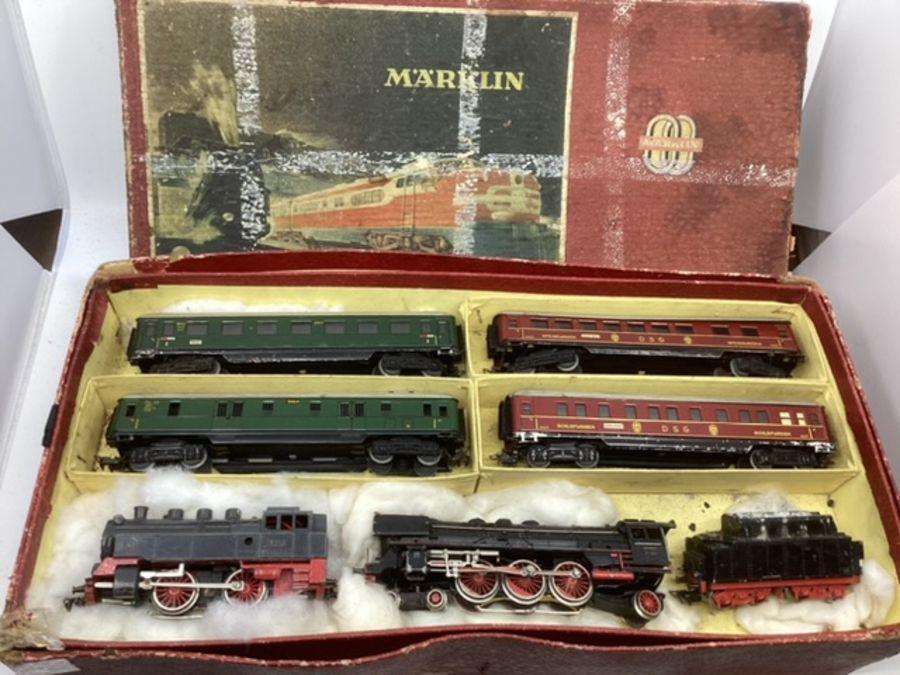 Fine 1940s German Marklin train Model Railway interest A rather wonderful all Original boxed Marklin train loco collection 1949 with 2 layer box with trains and carriages and track all original to