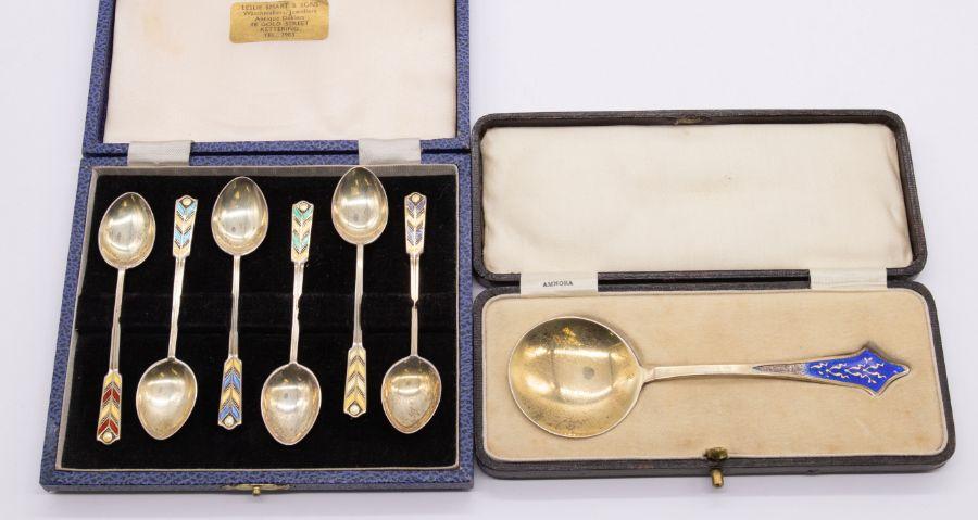 A cased set of six mid 20th century silver tea spoons with enamelled ...