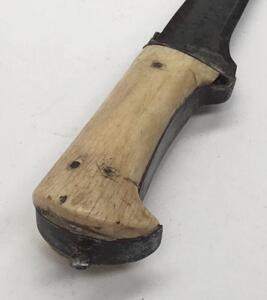 A 19th century Indo-Persian Pesh-Kabz dagger.
 Straight single edged blade, un-fullered, with T cross section along the spine.
 Scalloped design to the ricasso on both sides.
 Bone slab grips, secured with 3 rivet to each side.
 Approximately 42cm length. - 3