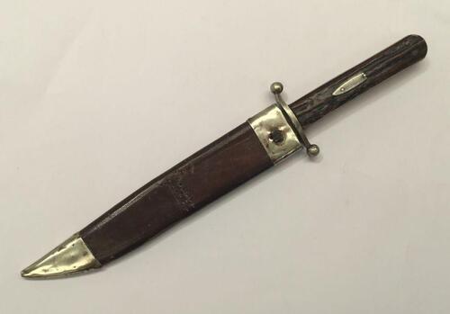 A mid to late 19th century Bowie knife by Joseph Rodgers & Son of Sheffield.
 Antler grips with nickel cross guard and applied nickel cartouche to the handle.
 Steel blade with makers mark and corporate Maltese Cross mark to the ricasso.
 Complete with ni