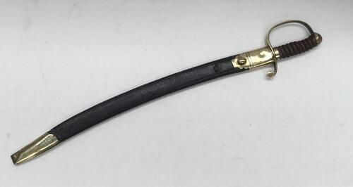 A 19th century, post 1850 Police Constabulary or Prison Wardens sword, with associated scabbard.
 Standard pattern of the era, with brass pommel, D shaped knuckle guard, cross guard and quillon.
 Steel single edged curved blade, with button release catch 