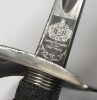 An 1897 pattern WW1 era British infantry officers sword, with unusual non pieced guard.
 Steel guard with nickel plating, with engraved crown and cypher of George V.
 Shagreen grip with wire binding, chequered backpiece, and knopped finial.
 Leather washe - 9