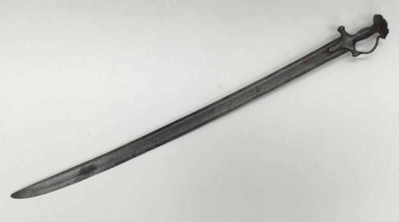 An 18th / 19th century Indian Talwar sword of all steel construction.
 A very long example, with a blade measuring over 33 inches / 84cm.
 Traditional cruciform hilt, with disc shaped pommel and knopped finial.
 Convex quillons with attached knuckle guard