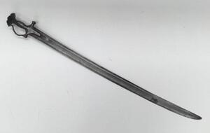 An 18th / 19th century Indian Talwar sword of all steel construction.
 A very long example, with a blade measuring over 33 inches / 84cm.
 Traditional cruciform hilt, with disc shaped pommel and knopped finial.
 Convex quillons with attached knuckle guard - 2