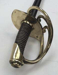 An fine quality early 19th century French cuirassiers broadsword, dated 1822.
 Brass 4 bar hilt, with leather grip covered by brass twisted wire binding.
 Double fullered blade with issue stamps at the ricasso.
 Engraved very faintly to the flat spine wit - 2