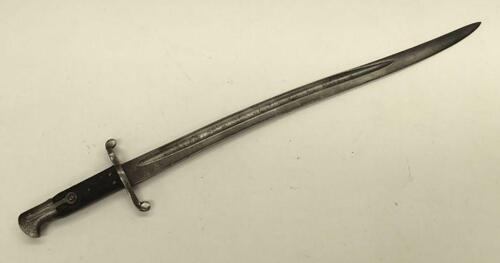 An 1856/58 pattern Enfield sword bayonet, with Manchester Regiment / Grenadier Guards interest.
 Chequered leather grips, with steel cross guard, quillon and muzzle ring.
 Recurved Yataghan blade with single fuller to both sides.
 Single edged, with false