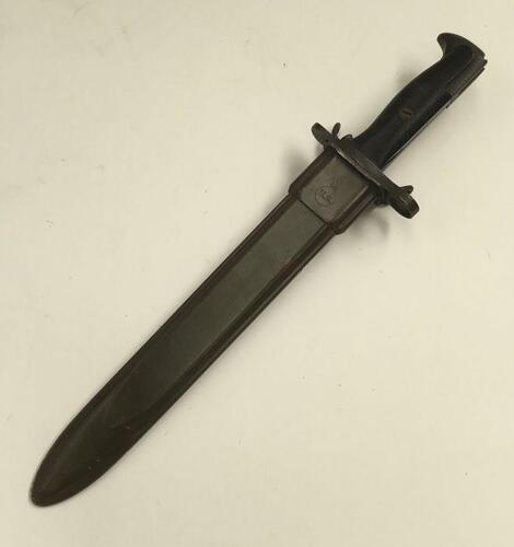 A U.S. WW2 era M1 bayonet and scabbard for the Garand rifle.
 Formerly the M1905 bayonet made by Springfield, the blades were shortened to 10 inches from 16 inches during WW2.
 This was carried out by UFH (United Fork & Hoe), and their details are stamped