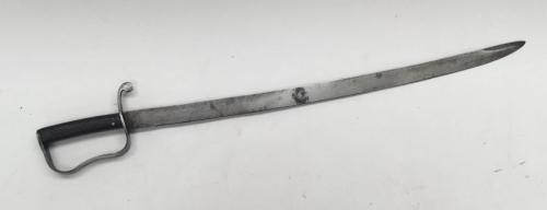 A mid 19th century Anglo-Indian artillery foot soldier sword, likely heavily inspired by the British 1853 pattern cavalry troopers sword.
 Chequered leather grips held in place by 5 rivets.
 Steel cross guard and quillon, plus D shaped knuckle guard.
 Plain un-fullered blade, single edged with flat spine.
 Hindi mark to knuckle guard.
 Approximately 78.2cm length, blade length 66cm.
 Condition: fair.
 Darkened patination to the steel, and some contact bumps to the flattened spine.
 One side of t