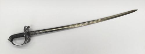 A fine quality 19th century Victorian 1827 pattern Rifles Officers sword, with fire gilded blade.
 Gothic steel guard with integral crowned rifles badge and curled quillon.
 Fish skin grip with copper wire binding.
 Part chequered backpiece with stepped pommel.
 Very slightly curved single edged blade, with flat spine and single fuller.
 Profusely etched blade, with foliage, cartouches, the VR royal monogram and crown, plus the Rifles Regimental badge.
 Proof mark to the ricasso, plus the remain