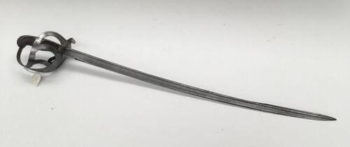 An German M1852  pipe back cavalry sword.
 Steel guard with quillon, steel backpiece and pommel.
 Integral finger loop attached to the grip.
 Fish skin grip with twisted wire binding.
 Slightly curved single edged blade with pipe back.
 The blade is marke