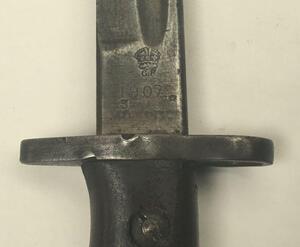 A British 1907 pattern bayonet, with scabbard and frog.
 Faintly date marked 3. 18 at the ricasso.
 GR and crown marked, along with various inspection stamps and bend test marks.
 The bayonet appears to have the later P1914/17 grooved grips fitted, but is - 3