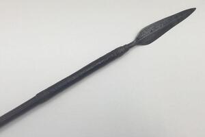 A 19th century South African throwing spear, possibly a Zulu Iklwa.
 Polished wooden shaft with flared and shaped end.
 Hand forged diamond section blade, with raised median ridge to both sides.
 The blade is secured to the shaft with what appears to be a - 2