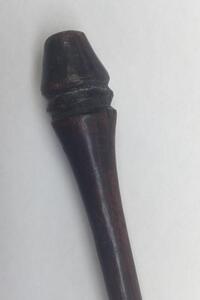 A 19th century South African throwing spear, possibly a Zulu Iklwa.
 Polished wooden shaft with flared and shaped end.
 Hand forged diamond section blade, with raised median ridge to both sides.
 The blade is secured to the shaft with what appears to be a - 6