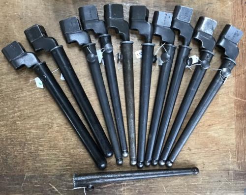 Collection of Ten British WW2 Spike Bayonets all in scabbards (two non tapered type) and all Number 4 Mark 2’s with one other scabbard.