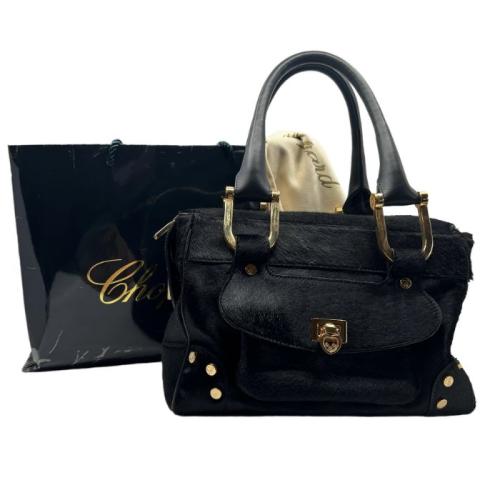 A black pony skin Chopard handbag with rose gold tone hardware