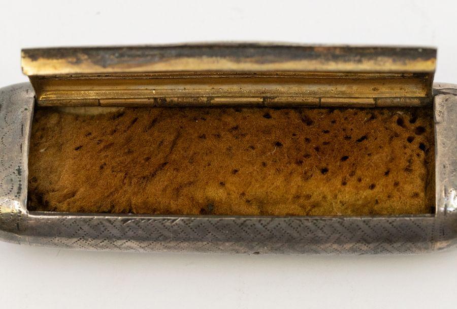 A George III silver oblong snuff box, engraved zig zag decoration to ...