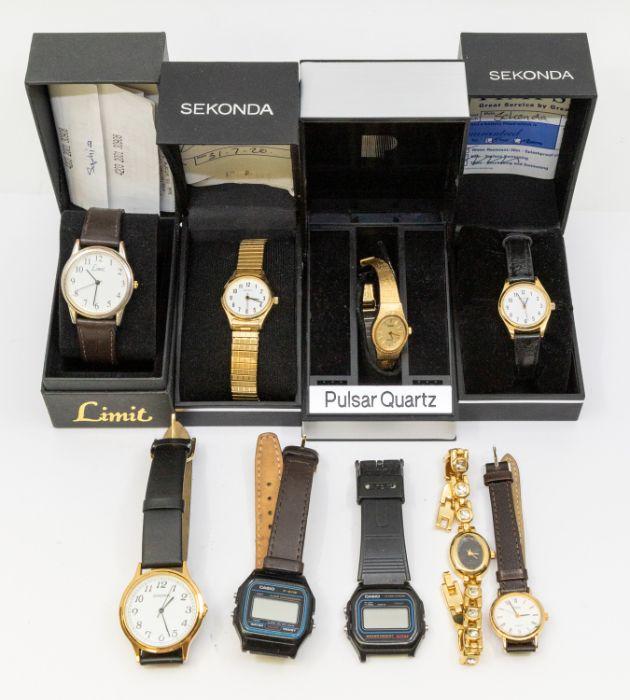 A collection of wristwatches to include two ladies gold plated Sekonda ...
