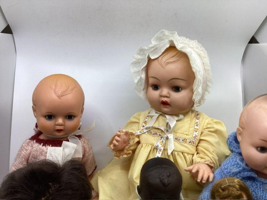Vintage Sasha baby doll 12 1972 ( a girl sexed baby) with raised eyelids  pink mark to