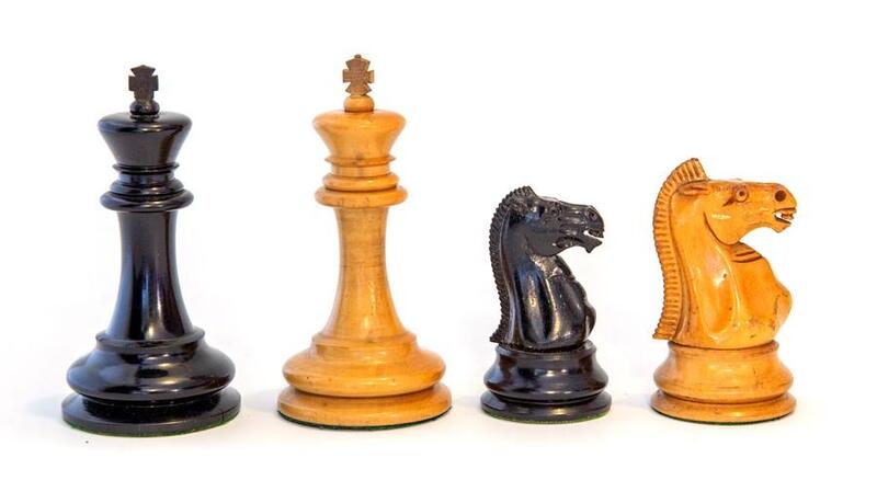 A Staunton Chess-Men chess set, the white king, (height 9cm) marked ...