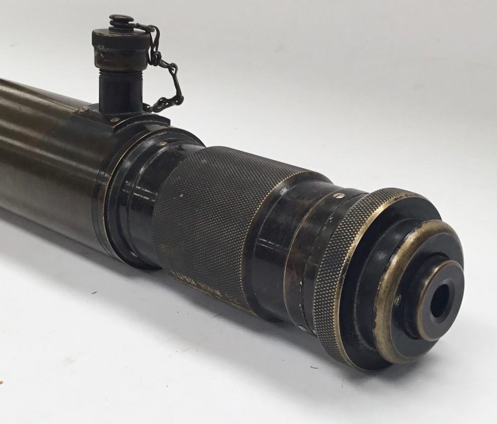 A brass military tank gun sight telescope, undated but possibly