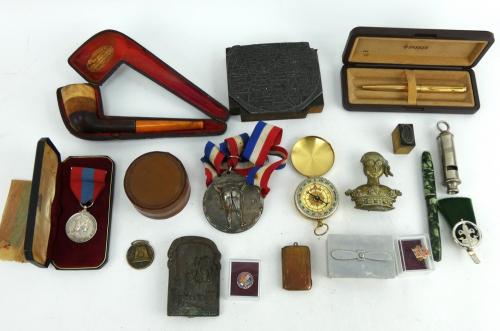 Mixed collectables to include pens, medals, meerschaum pipe in case, trench art box., Tunbridge Wells map block, whistle, badges etc.