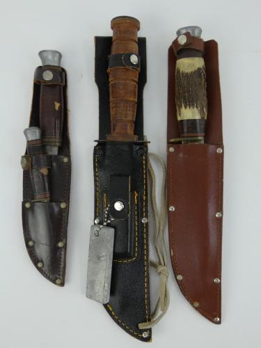 Three sport sheath knives including one with antler handle, one with anodised blade and a twin scout knife