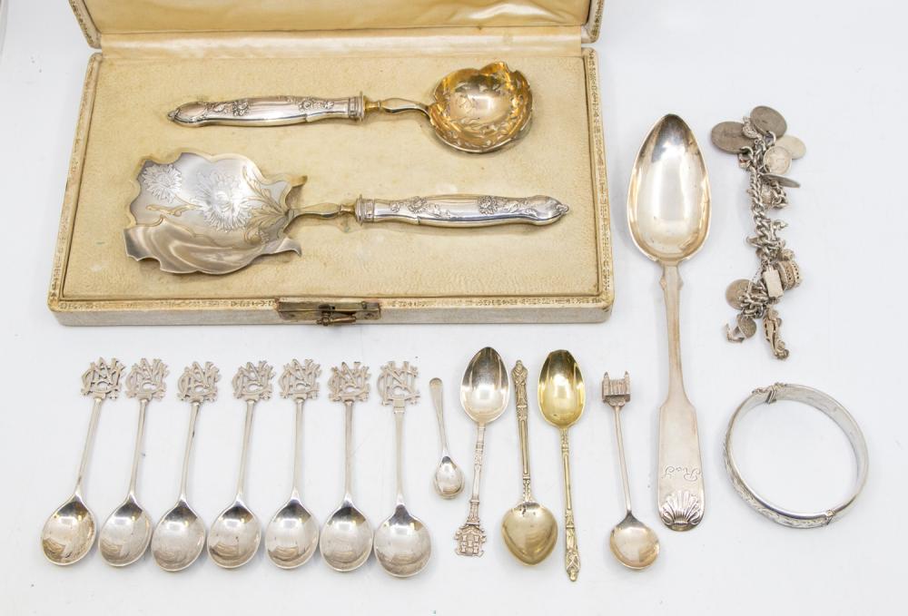 A collection of silver to include: a Swedish 18th Century fiddle and ...