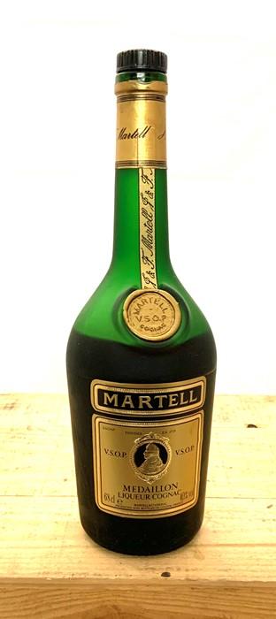 A selection of different bottles including Martell's Medaillon