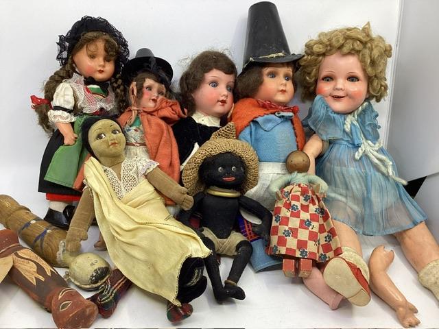 Antique and Vintage dolls with painted bisque and composition heads composition Shirley temple with arms off and Norah welling black and Indian felt cloth dolls and aboriginal carved craft doll and