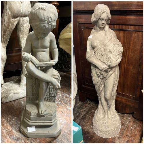 A pair of cast statues,  a semi nude lady and a small boy reading  small boy stands approximately 42cm High  and lady stands approximately 78cm High.  (2)