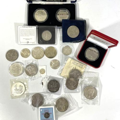 4 Britannia £2 silver coins and a £5 silver coin.  A pobjoy mint 5 Rupees coin, A Victorian crown dated 1894 and other coins.  Silver weight approximately 200 grams