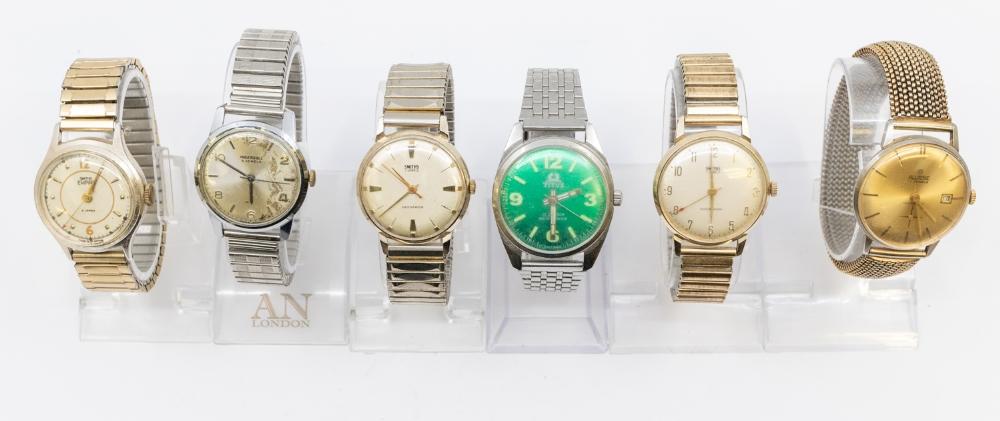 Selection of six vintage mechanical watches. To include an Allaine 17 Jewels Incabloc watch an Ingersoll 5 Jewels watch a Titus 17 Jewels Shockproof watch two Smiths 7 Jewels Shockproof watches and